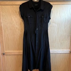 Madewell black silk short sleeved button down dress. Size 4.